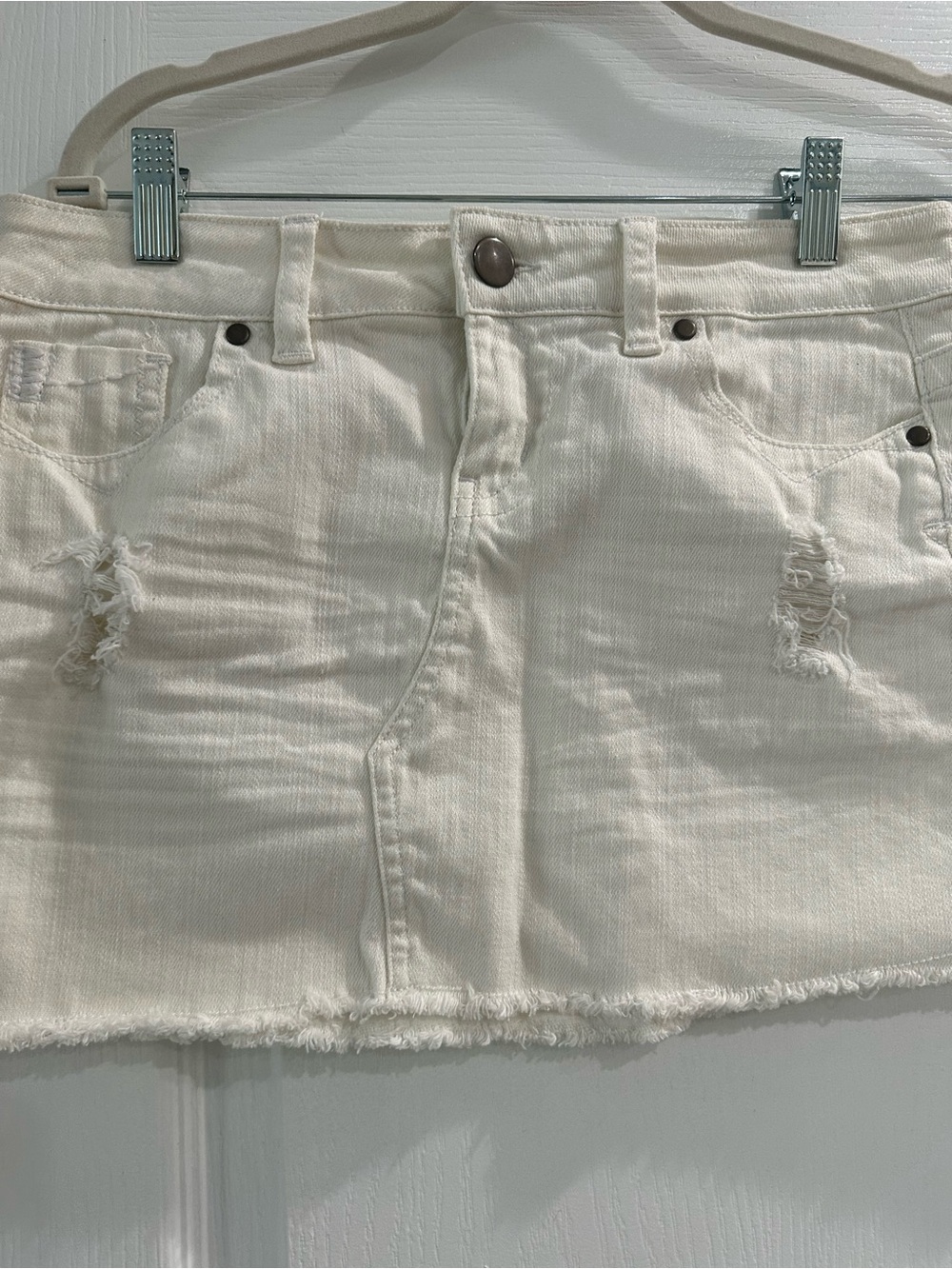 dELiA*s Cream Distressed Denim Mini Skirt